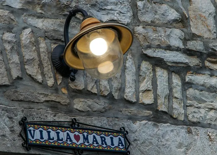 Maria Villa *